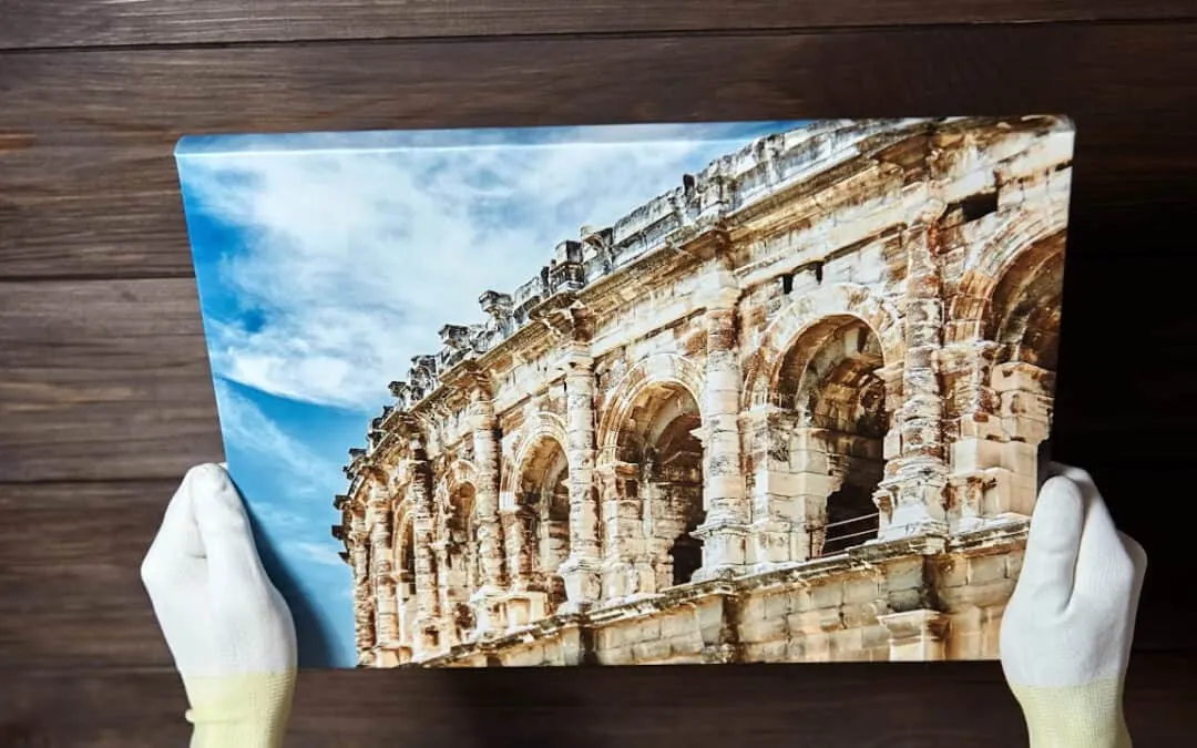High quality gallery wrapped canvas print of ancient Roman architecture being displayed with white cotton gloves showing museum quality construction